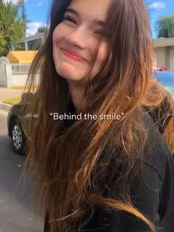 Behind the smile