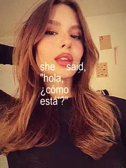 she said hola como