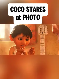 COCO STARES AT PHOTO